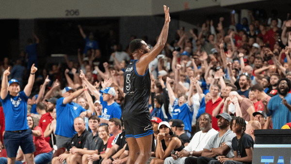 La Familia's Andrew Harrison (5) celebrates shooting the game winning point ending the game 70-61 against The Ville on Monday, July 29, 2024 at Freedom Hall in Louisville, Ky. - © Clare Grant/Courier Journal / USA TODAY NETWORK